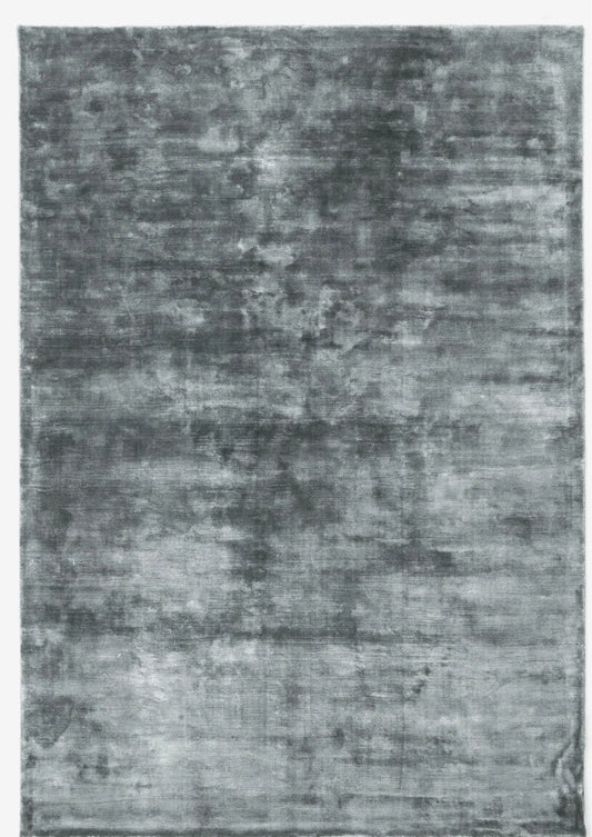 Gray textured area rug on a plain background