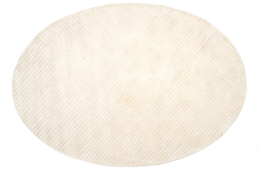 Round beige rug on a white background