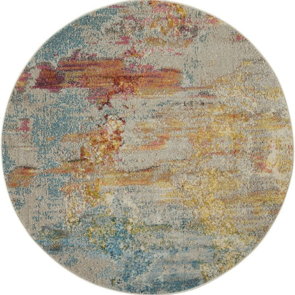 Round multicolored rug with abstract pattern on a white background