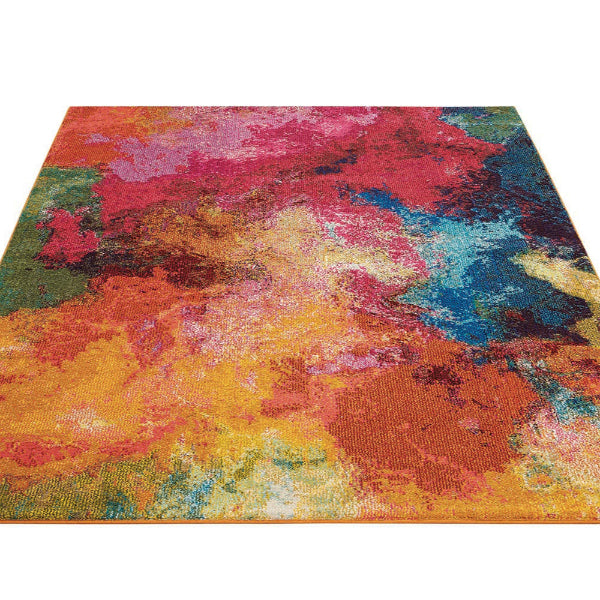 Multicolored abstract patterned rug on a white background