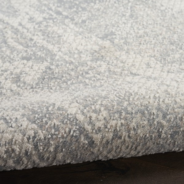 Close-up of textured grey rug
