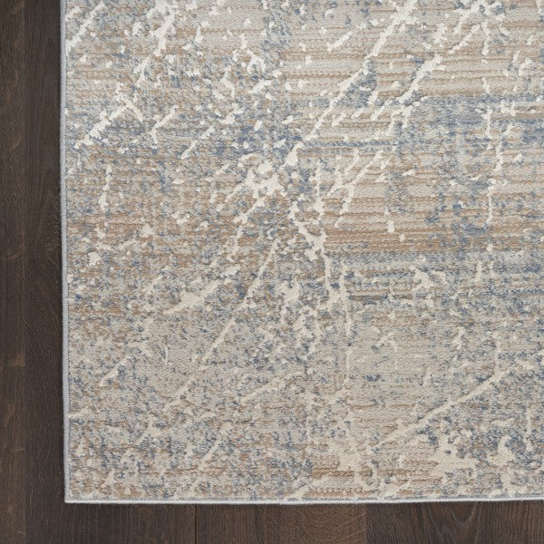 Close-up of a patterned rug on a wooden floor
