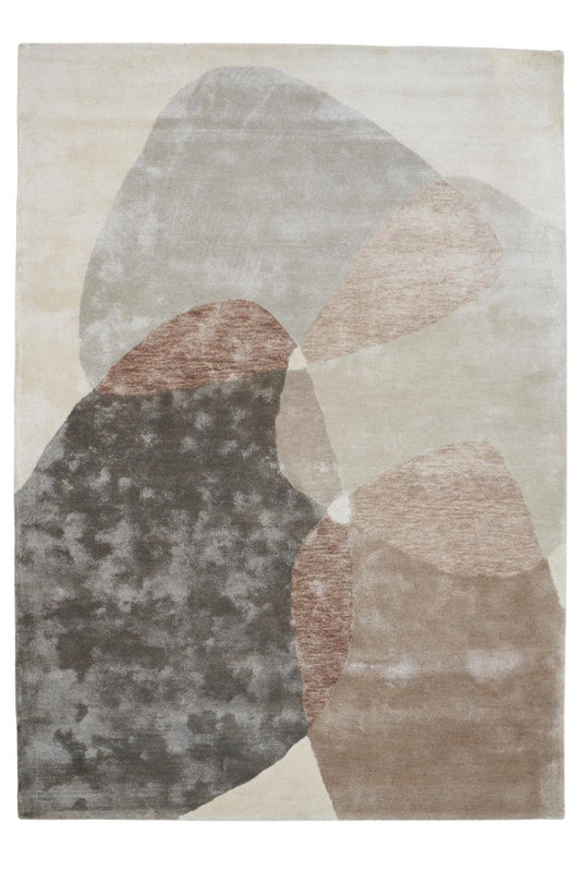 Abstract patterned rug with geometric shapes in neutral colors on a white background