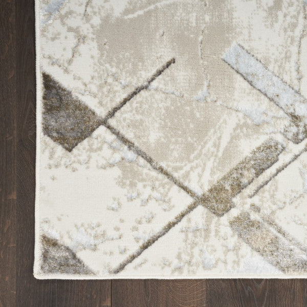 Geometric patterned rug on a wooden floor