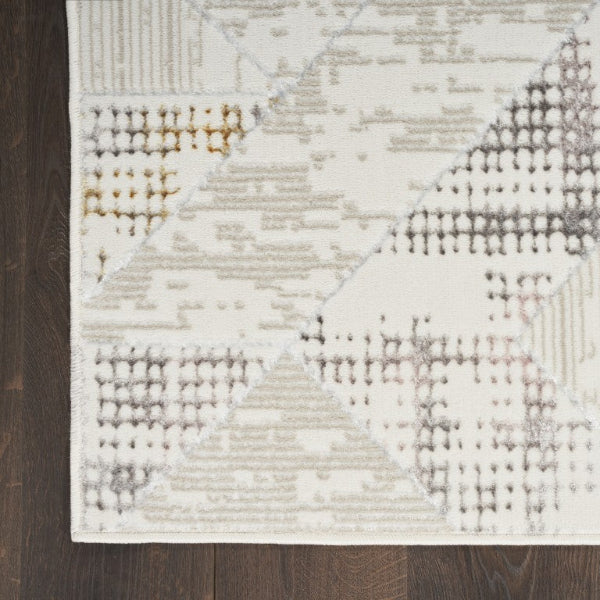 Textured area rug with geometric pattern on a wooden floor