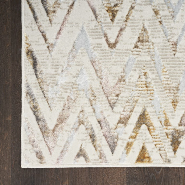 Close-up of a textured area rug with geometric pattern on a wooden floor.