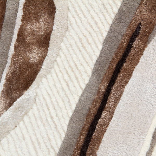 Close-up of a textured rug with brown and beige patterns