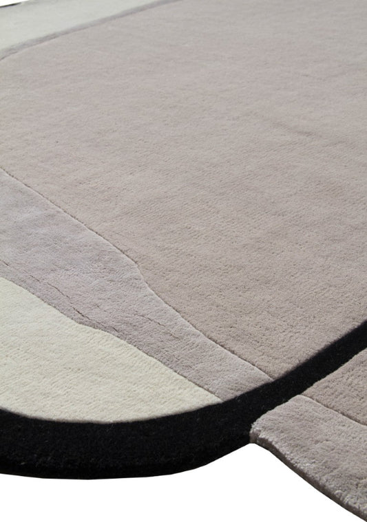 Round gray rug with a gradient design on a white background