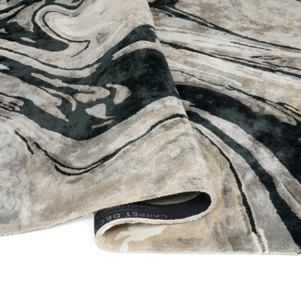 Marble-patterned fabric with black and gray swirls on a white background