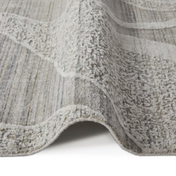Close-up of Concept Looms Dune Rug showing luxury textured patterns in neutral grey tones