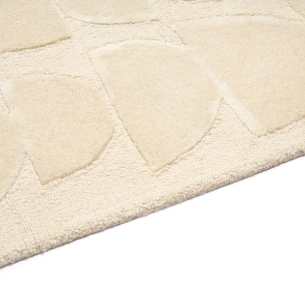 Close-up of a textured rug mat on a white background