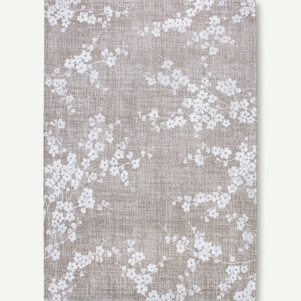 Louis De Poortere Sakura rug luxury design with delicate white floral pattern on taupe background