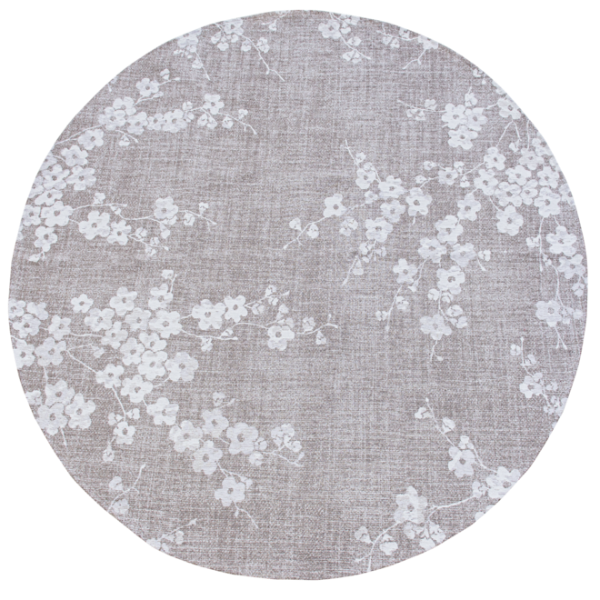 Round luxury Louis De Poortere Sakura rug with subtle white floral pattern on soft grey background