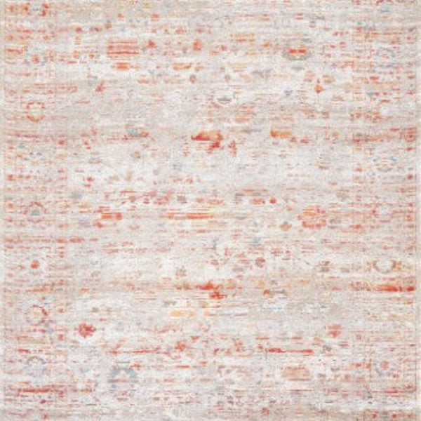 Louis De Poortere Ushak rug in soft beige and orange tones with subtle vintage patterns