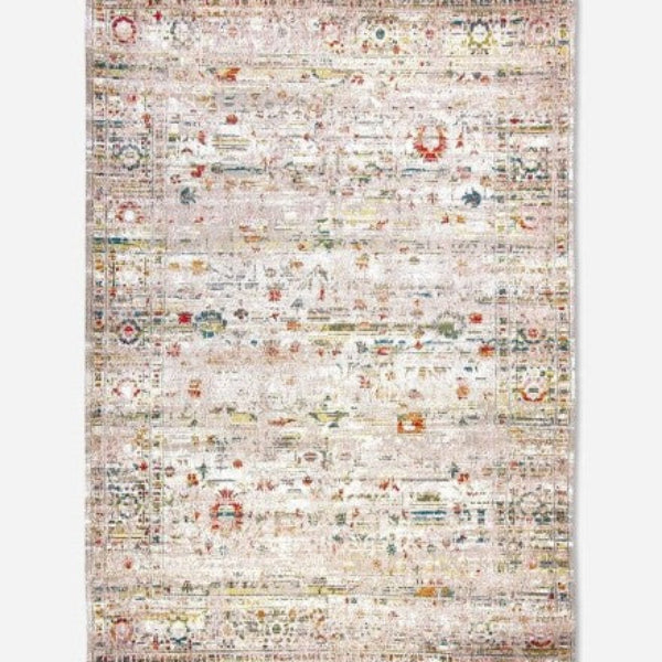 Louis De Poortere Ushak rug with intricate vintage pattern in muted earth tones luxury rug
