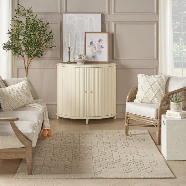 Nourison Alessia rug in beige with geometric pattern in a modern living room setting