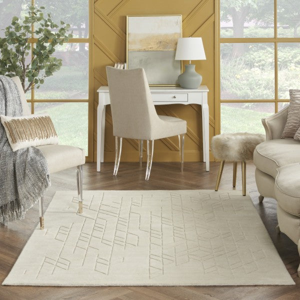 Nourison Alessia rug in a beige colour with subtle geometric patterns in a modern living room