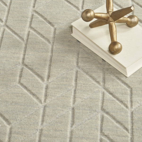 Close-up of the luxury Nourison Alessia rug in neutral tones with geometric embossed pattern