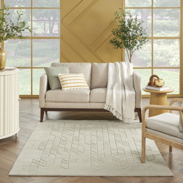 Nourison Alessia rug in a modern living room with beige sofa and light wood furniture