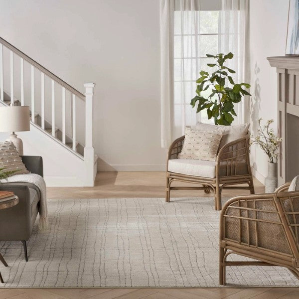 Elegant living room with Nourison Andes Rug Collection luxury rug featuring subtle linear patterns and neutral tones