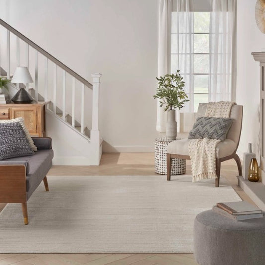Elegant living room featuring a luxury rug from the Nourison Andes Rug Collection in neutral tones