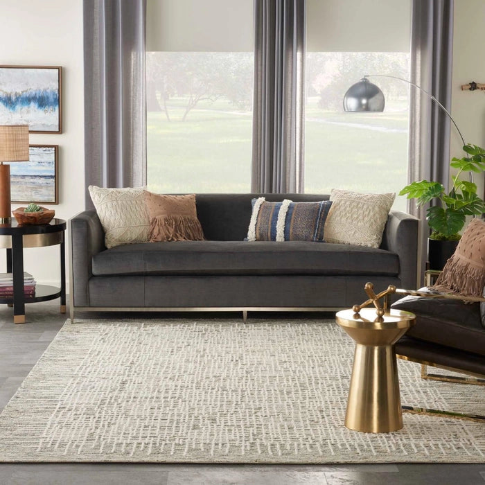 Nourison Colorado Rug Geometric Design luxury rug in a modern living room with grey sofa and decorative cushions