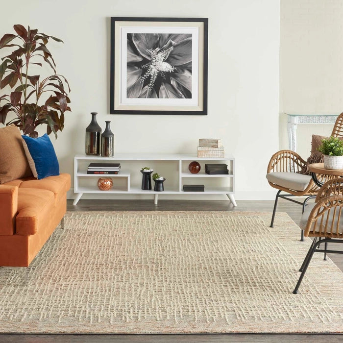 Nourison Colorado Rug Geometric Design luxury rug in beige tones placed in modern living room with sofa and chairs