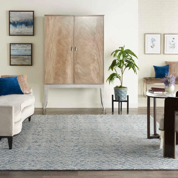 Nourison Colorado Rug Geometric Design luxury rug in blue and grey tones on wooden floor in modern living room