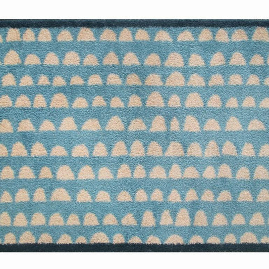 Turtle Mats Priya Door Mat in blue with beige semi-circle pattern and black border floor mat