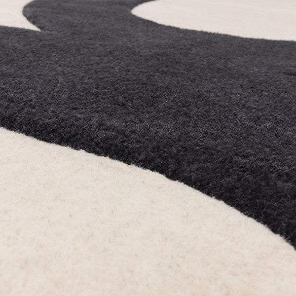 Close-up of Asiatic luxury rug with black and white pattern featuring Contemporary Design Canvas Rug