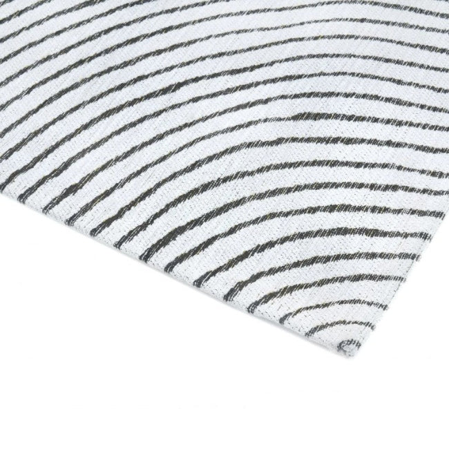 Striped fabric with black and white lines on a white background