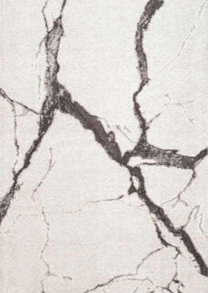 Close-up of a marble-like surface with gray and white patterns