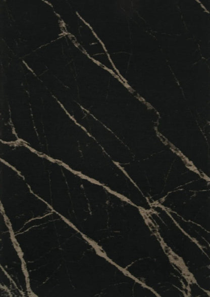 Close-up of a dark textured surface with cracks and patterns