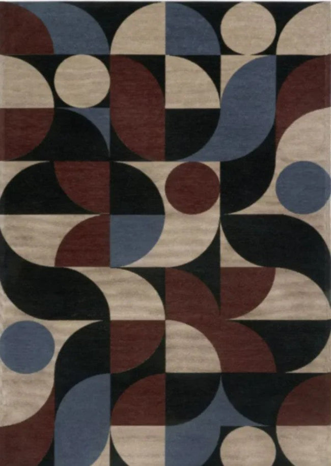 Geometric patterned rug with circular shapes in various colors on a neutral background