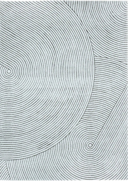 Black and white circular pattern on a textured background