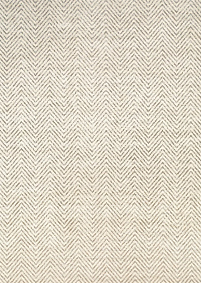 Textured fabric pattern with a zigzag design in beige tones.