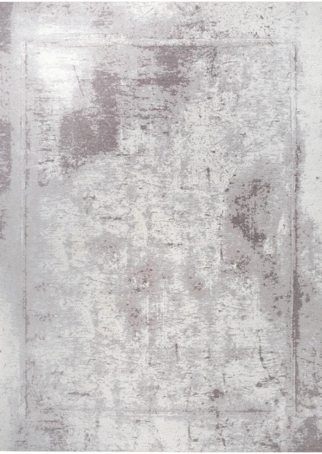 Textured rug with a mix of gray and white colors