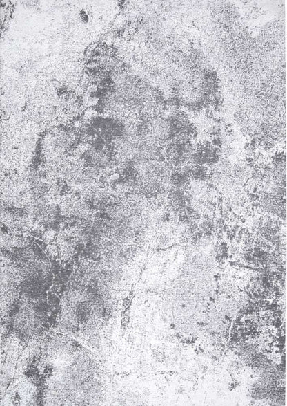 Textured grey and white rug resembling the surface of the moon