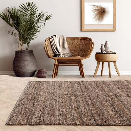 Abbus Boho Style Luxury Rug in a modern living space with a chair and decorative plant