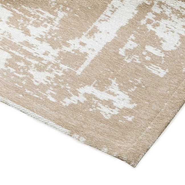 Close-up of a beige and white patterned rug on a white background