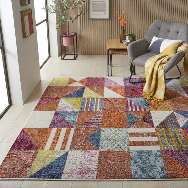 Concept Looms Carnaval Rug with colourful geometric patterns in a modern living room setting