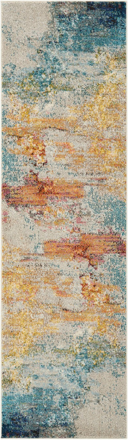 Colorful abstract patterned rug with a gradient of blue, yellow, and orange.
