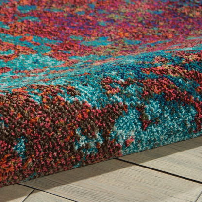 Multicolored textured rug on a wooden floor