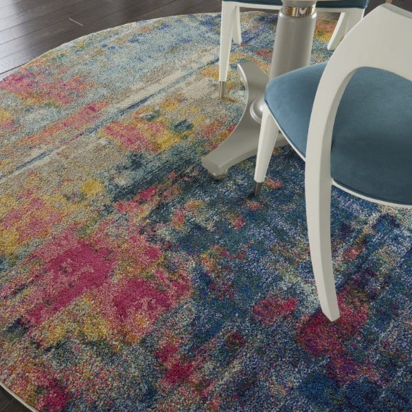 Colorful abstract patterned rug with a chair on top