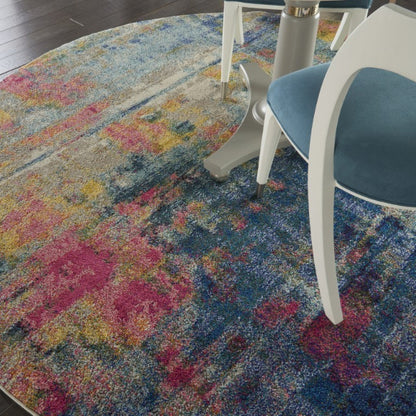 Colorful abstract patterned rug with a chair on top