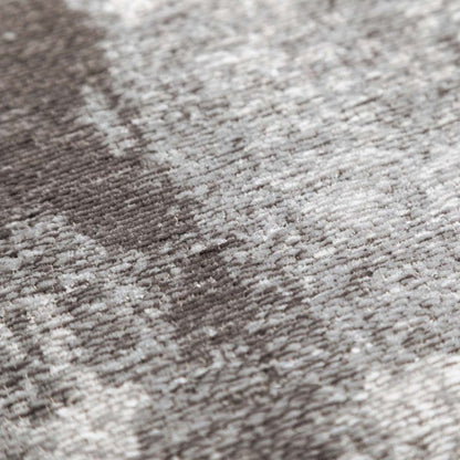 Close-up of a textured grey and white rug