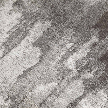 Textured grey and black patterned rug