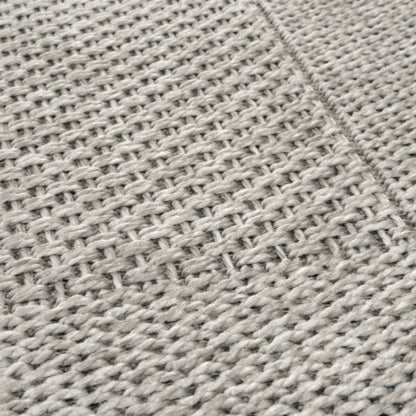 Close-up of a textured gray fabric surface
