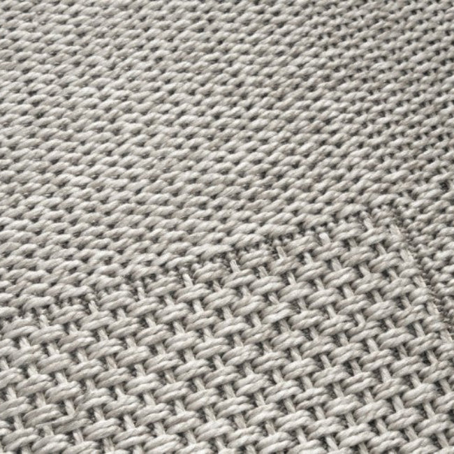 Close-up of a textured gray fabric surface