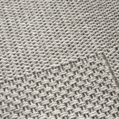 Close-up of a textured gray fabric surface